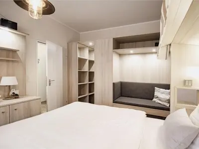 Ein Bett oder Betten in einem Zimmer der Unterkunft Ferienwohnung Strandkorb