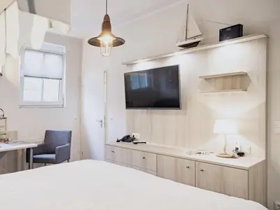 TV/Unterhaltungsangebot in der Unterkunft Ferienwohnung Strandkorb