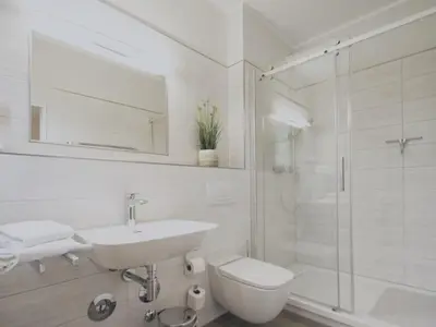 Ein Badezimmer in der Unterkunft Ferienwohnung Strandkorb