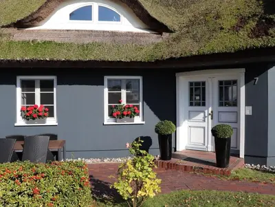 Ein Garten an der Unterkunft Grete