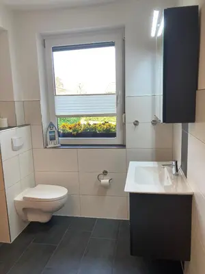 Ein Badezimmer in der Unterkunft Ferienwohnung OstseeStrandLäufer 3