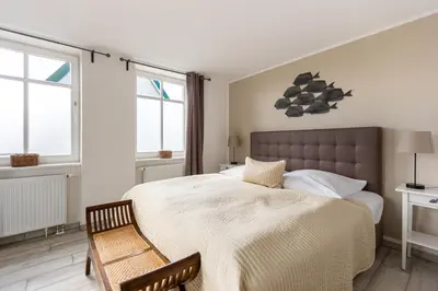 Ein Bett oder Betten in einem Zimmer der Unterkunft Witt Hus
