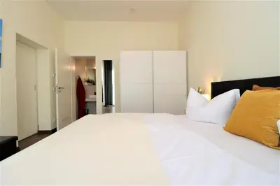 Ein Bett oder Betten in einem Zimmer der Unterkunft Käptn Brass Appartement 06