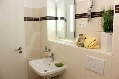 Ein Badezimmer in der Unterkunft Käptn Brass Appartement 13