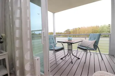Ein Balkon oder eine Terrasse in der Unterkunft Käptn Brass Appartement 15 Deichblick