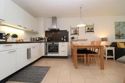 Küche/Küchenzeile in der Unterkunft Käptn Brass Appartement 15 Deichblick