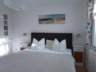 Ein Bett oder Betten in einem Zimmer der Unterkunft Käptn Brass Appartement 18