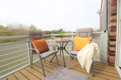 Ein Balkon oder eine Terrasse in der Unterkunft Käptn Brass Appartement 22