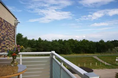 Ein Balkon oder eine Terrasse in der Unterkunft Käptn Brass Appartement 23 Düne 10