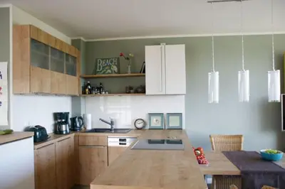 Küche/Küchenzeile in der Unterkunft Käptn Brass Appartement 23 Düne 10