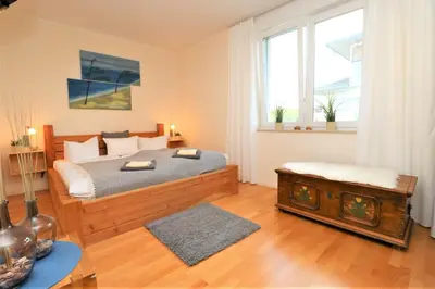 Ein Bett oder Betten in einem Zimmer der Unterkunft Käptn Brass Villa 1 App 4