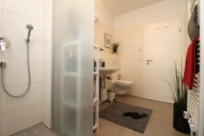 Ein Badezimmer in der Unterkunft Käptn Brass Villa 1 App 4