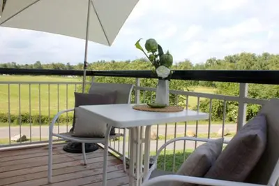 Ein Balkon oder eine Terrasse in der Unterkunft Käptn Brass Villa 1 App 4