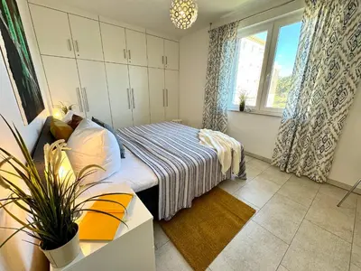 Ein Bett oder Betten in einem Zimmer der Unterkunft Käptn Brass Villa 2 App 4 Seestern