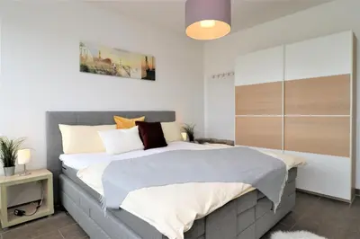 Ein Bett oder Betten in einem Zimmer der Unterkunft Käptn Brass Villa 2 App 6 Sünnsiet
