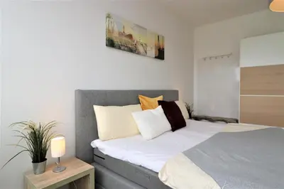 Ein Bett oder Betten in einem Zimmer der Unterkunft Käptn Brass Villa 2 App 6 Sünnsiet