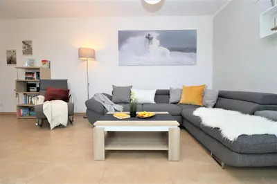 Ein Sitzbereich in der Unterkunft Käptn Brass Villa 2 App 6 Sünnsiet