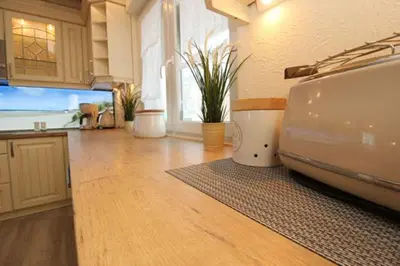 Küche/Küchenzeile in der Unterkunft Käptn Brass Villa 2 App 7 Penthouse Ambiente