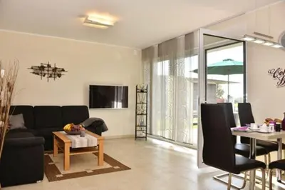 TV/Unterhaltungsangebot in der Unterkunft Käptn Brass Villa 3 App 3 Strandmuschel