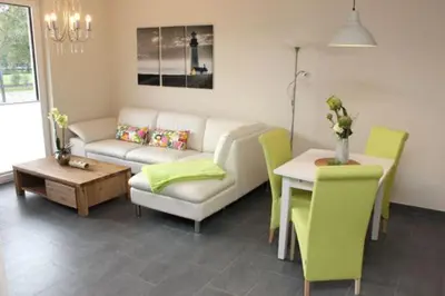 Ein Sitzbereich in der Unterkunft Käptn Brass Villa 5 App 2