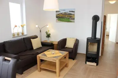 Ein Sitzbereich in der Unterkunft Käptn Brass Villa 5 App 3 Strandrose