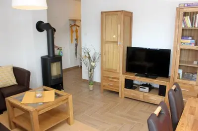 TV/Unterhaltungsangebot in der Unterkunft Käptn Brass Villa 5 App 3 Strandrose