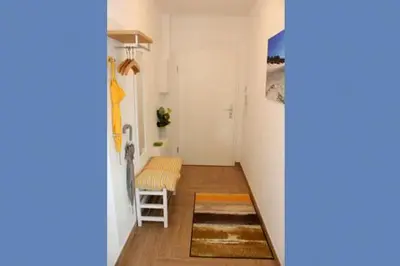 Ein Bett oder Betten in einem Zimmer der Unterkunft Käptn Brass Villa 5 App 3 Strandrose