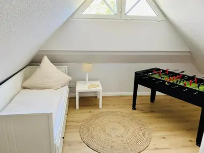 Ein Bett oder Betten in einem Zimmer der Unterkunft Strandhaus LUMA - hochwertiges Ferienhaus für 6 Personen in Strandnähe