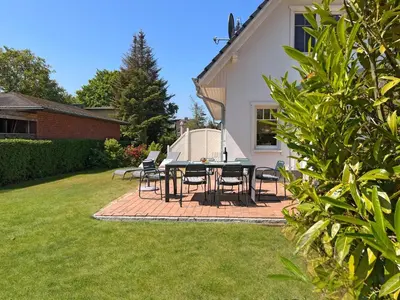 Ein Garten an der Unterkunft Meeresbrise