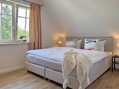 Ein Bett oder Betten in einem Zimmer der Unterkunft Meeresbrise