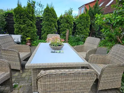 Ein Garten an der Unterkunft Ferienwohnung 1 Am Park
