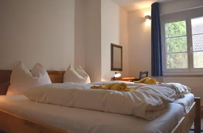 Ein Bett oder Betten in einem Zimmer der Unterkunft Resi M02