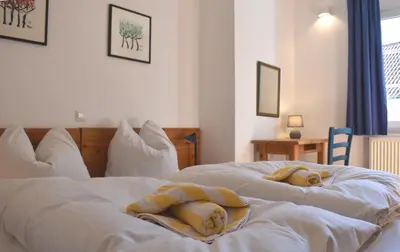 Ein Bett oder Betten in einem Zimmer der Unterkunft Resi K02
