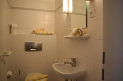 Ein Badezimmer in der Unterkunft Resi K02
