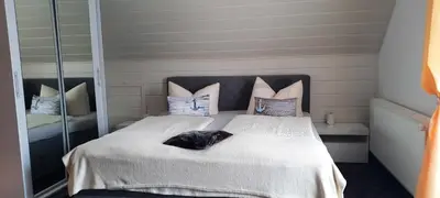 Ein Bett oder Betten in einem Zimmer der Unterkunft FeWo Wachsmuth
