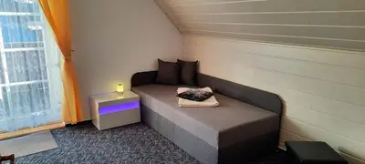 Ein Bett oder Betten in einem Zimmer der Unterkunft FeWo Wachsmuth