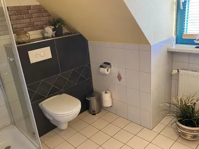Ein Badezimmer in der Unterkunft FeWo Austernfischer 600 Meter vom Strand