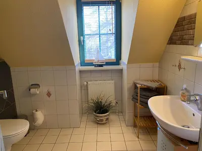 Ein Badezimmer in der Unterkunft FeWo Austernfischer 600 Meter vom Strand