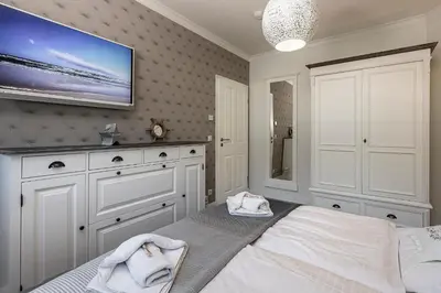 Ein Bett oder Betten in einem Zimmer der Unterkunft Villa Strandblick Zingst