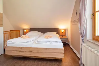 Ein Bett oder Betten in einem Zimmer der Unterkunft Frieda