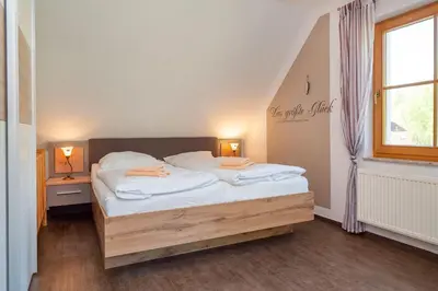 Ein Bett oder Betten in einem Zimmer der Unterkunft Frieda