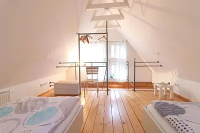Ein Bett oder Betten in einem Zimmer der Unterkunft Ferienhaus- die KATE in Barth am Bodden