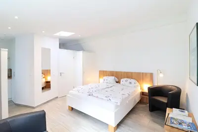 Ein Bett oder Betten in einem Zimmer der Unterkunft Ferienwohnung- modernes Apartment in Barth am Bodden