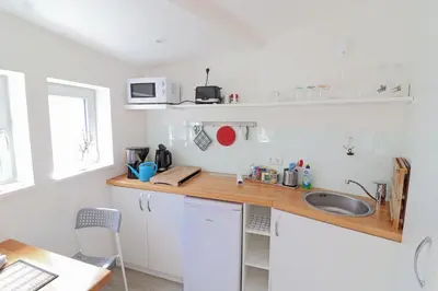 Küche/Küchenzeile in der Unterkunft Ferienwohnung- modernes Apartment in Barth am Bodden