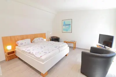 Ein Bett oder Betten in einem Zimmer der Unterkunft Ferienwohnung- modernes Apartment in Barth am Bodden