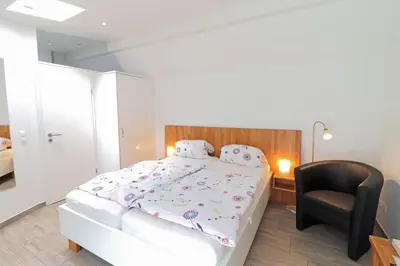 Ein Bett oder Betten in einem Zimmer der Unterkunft Ferienwohnung- modernes Apartment in Barth am Bodden
