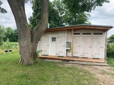 Ein Garten an der Unterkunft mongolische Jurte im ART.Quartier
