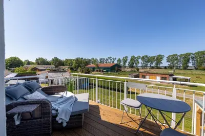 Ein Balkon oder eine Terrasse in der Unterkunft Haus TraumAnker