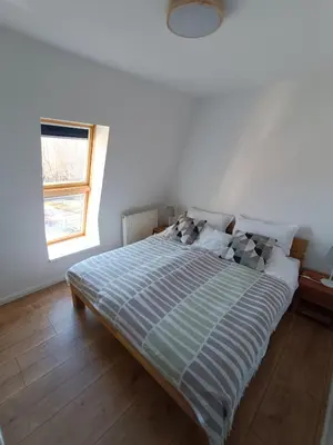 Ein Bett oder Betten in einem Zimmer der Unterkunft FeWo Vineta