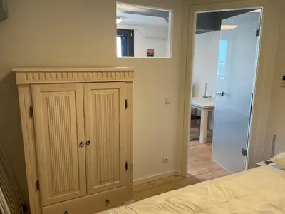 Ein Bett oder Betten in einem Zimmer der Unterkunft Apartment Boddenkieker